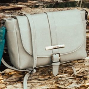 Damsel In Defense - Janie's Gotta Purse